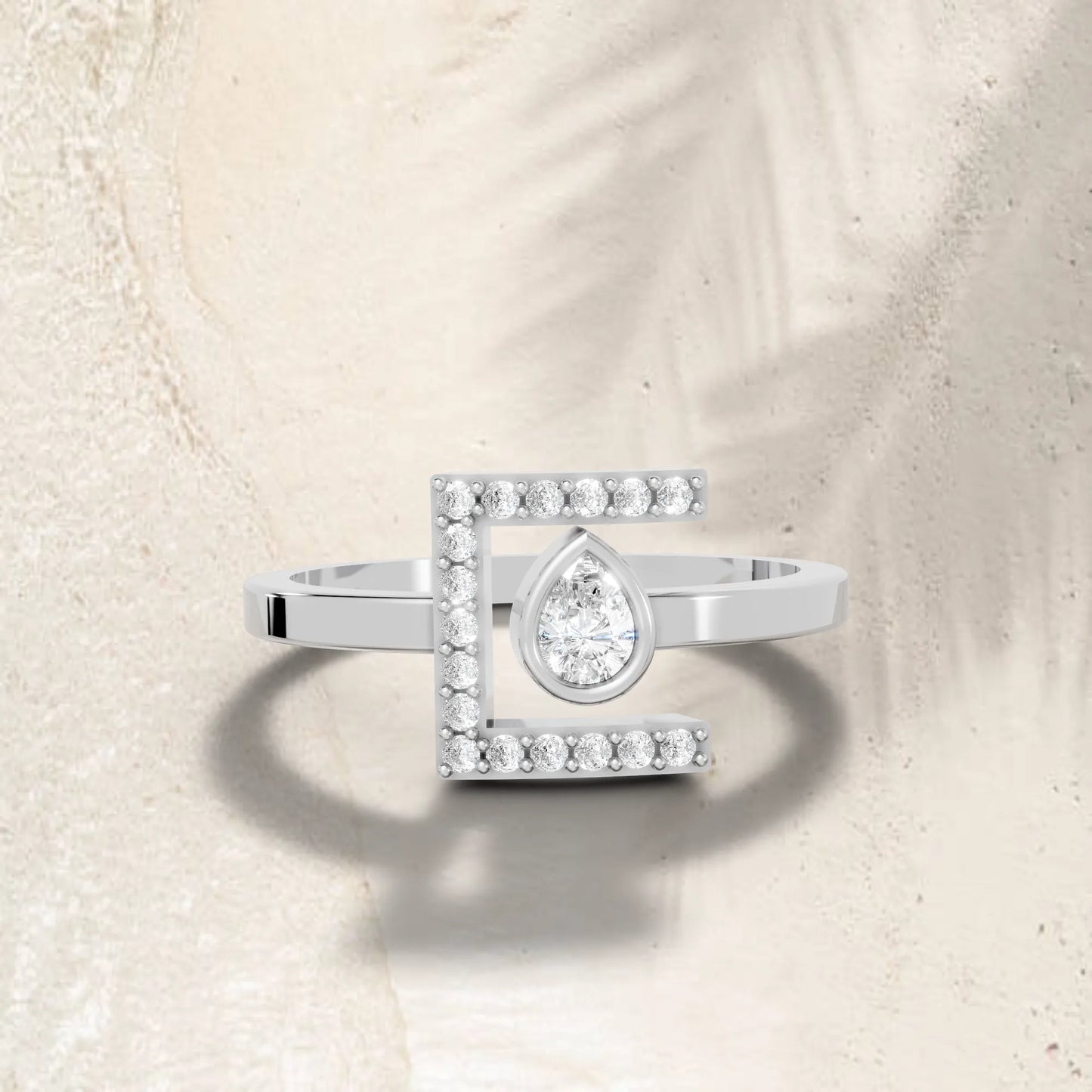 14K Gold Pear Cut Diamond Modern Bezel Engagement Ring with Accents