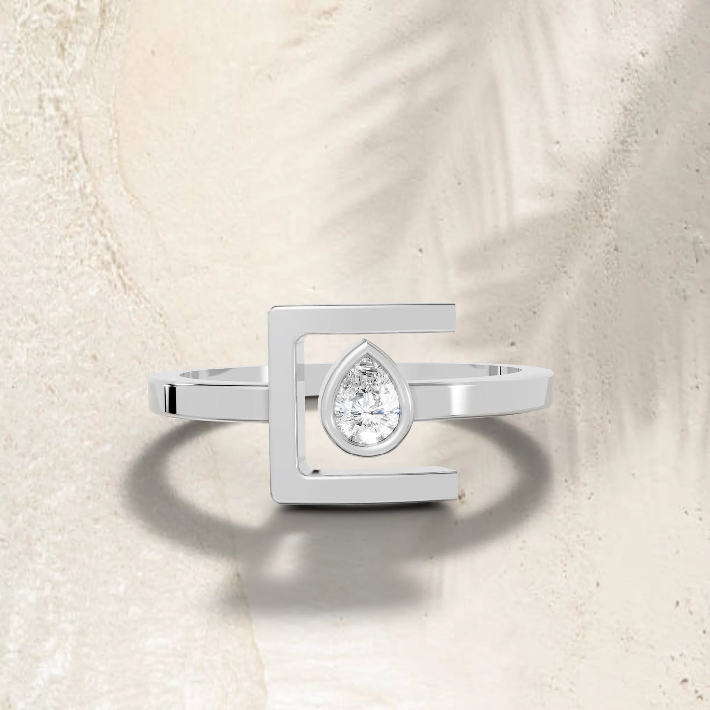 14K Gold Pear Cut Diamond Modern Bezel Engagement Ring