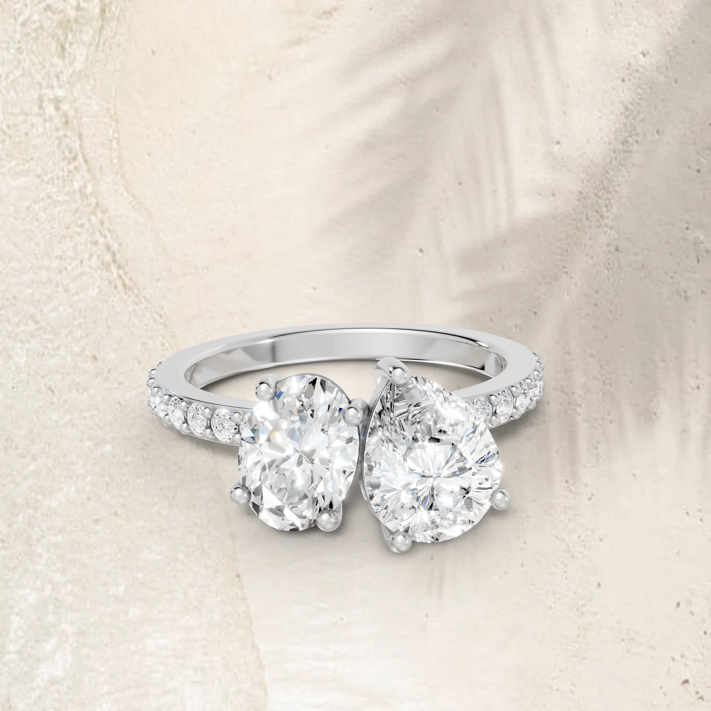 14K Gold Oval and Pear Cut Diamond Toi et Moi Engagement Ring with Side Accents