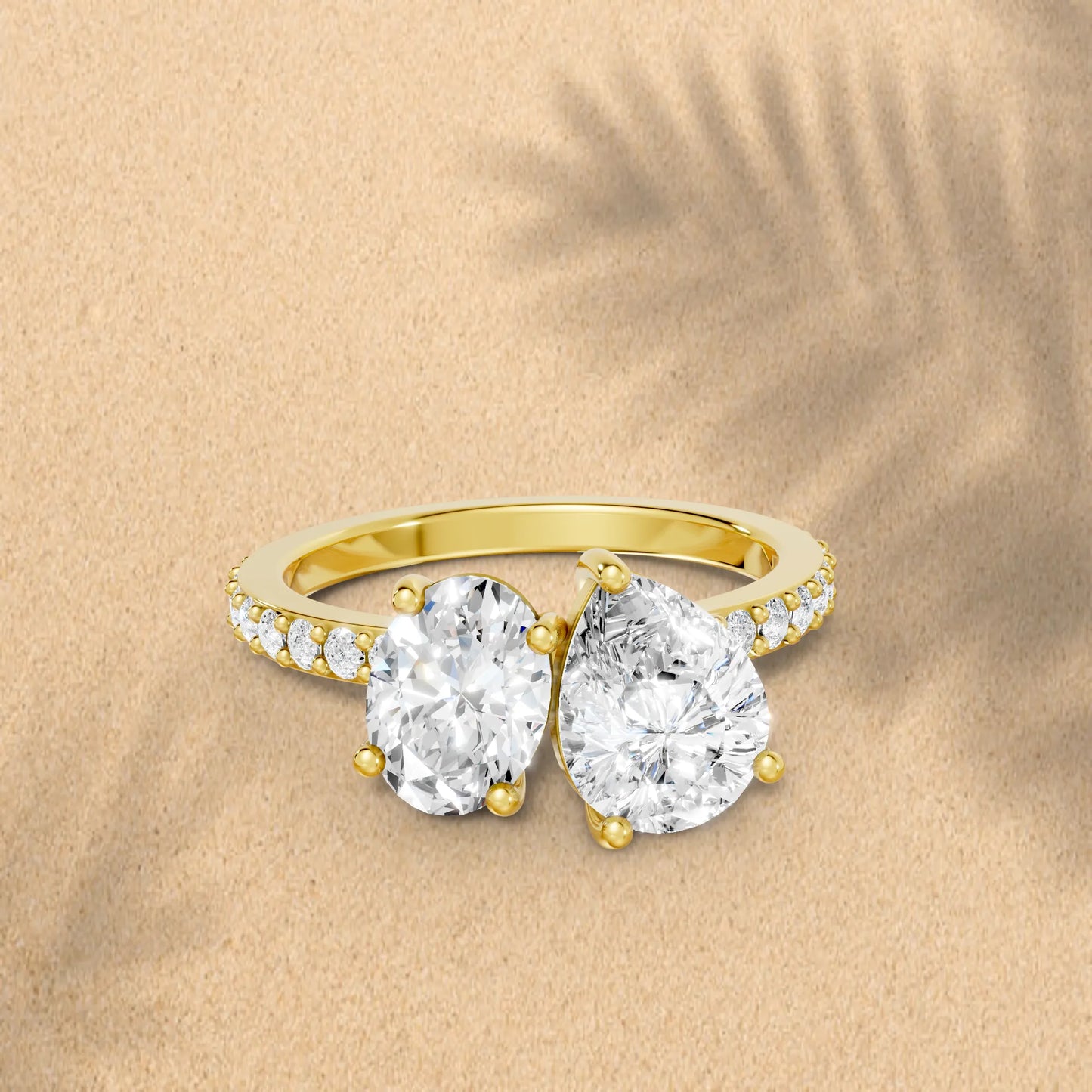 14K Gold Oval and Pear Cut Diamond Toi et Moi Engagement Ring with Side Accents