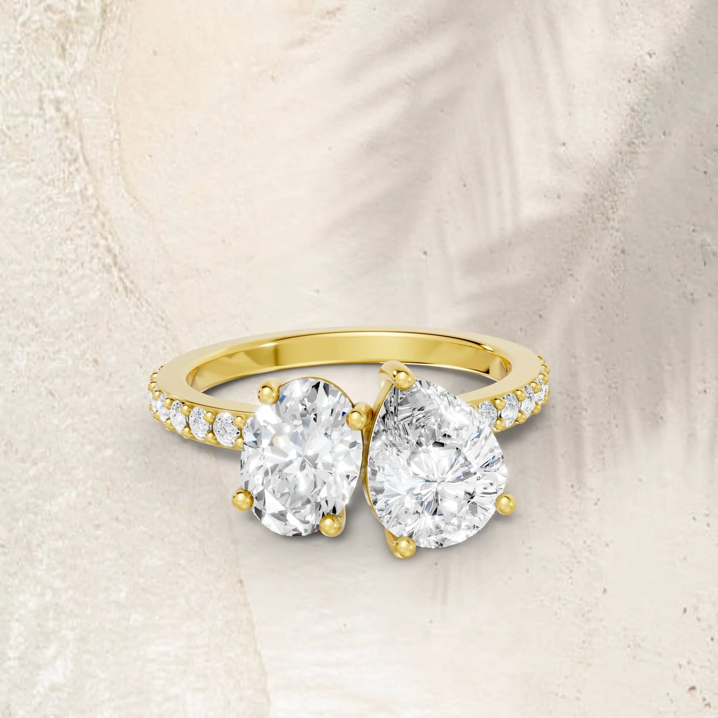 14K Gold Oval and Pear Cut Diamond Toi et Moi Engagement Ring with Side Accents