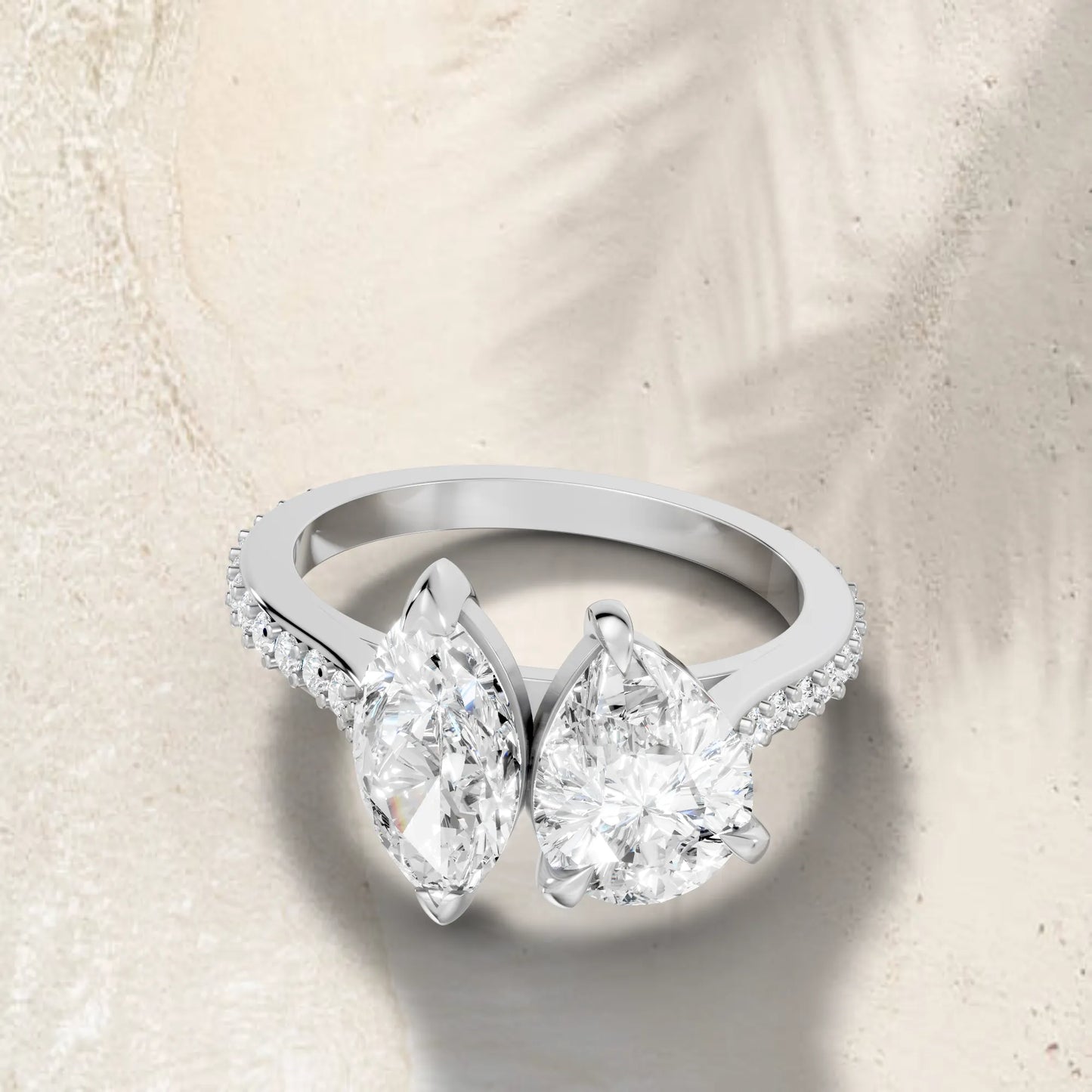 14K Gold Marquise and Pear Cut Diamond Toi et Moi Engagement Ring with Side Accents