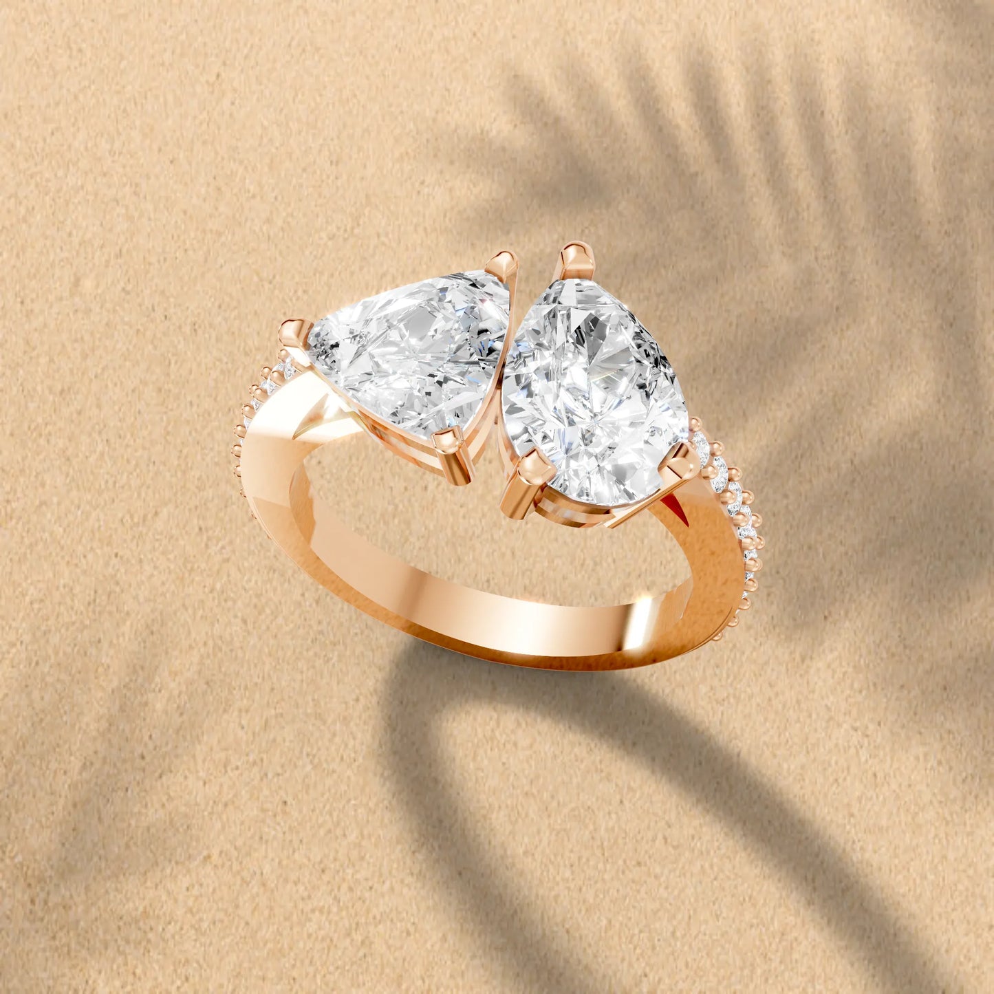 14K Gold Trillion and Pear Cut Diamond Toi et Moi Engagement Ring with Side Accents