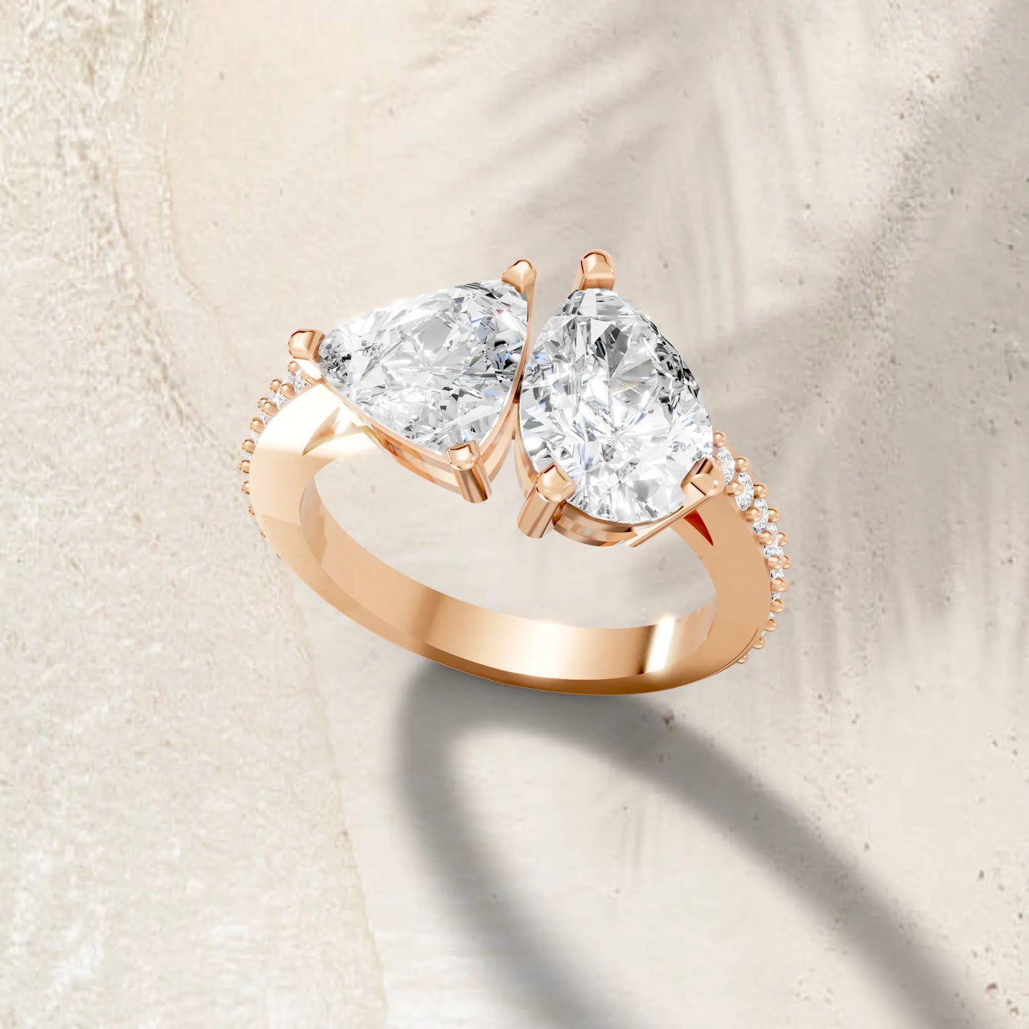 14K Gold Trillion and Pear Cut Diamond Toi et Moi Engagement Ring with Side Accents