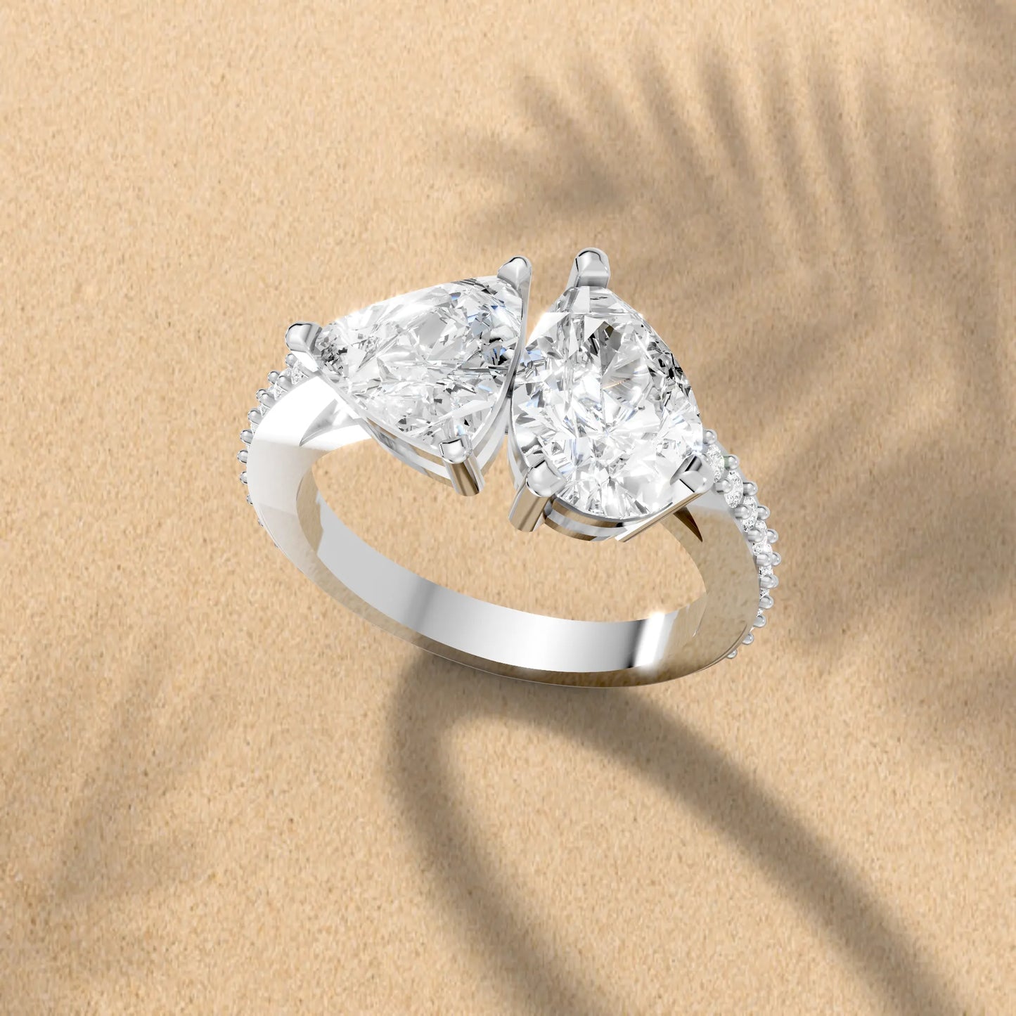 14K Gold Trillion and Pear Cut Diamond Toi et Moi Engagement Ring with Side Accents