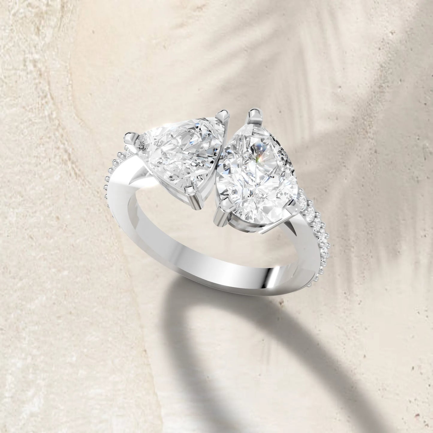 14K Gold Trillion and Pear Cut Diamond Toi et Moi Engagement Ring with Side Accents