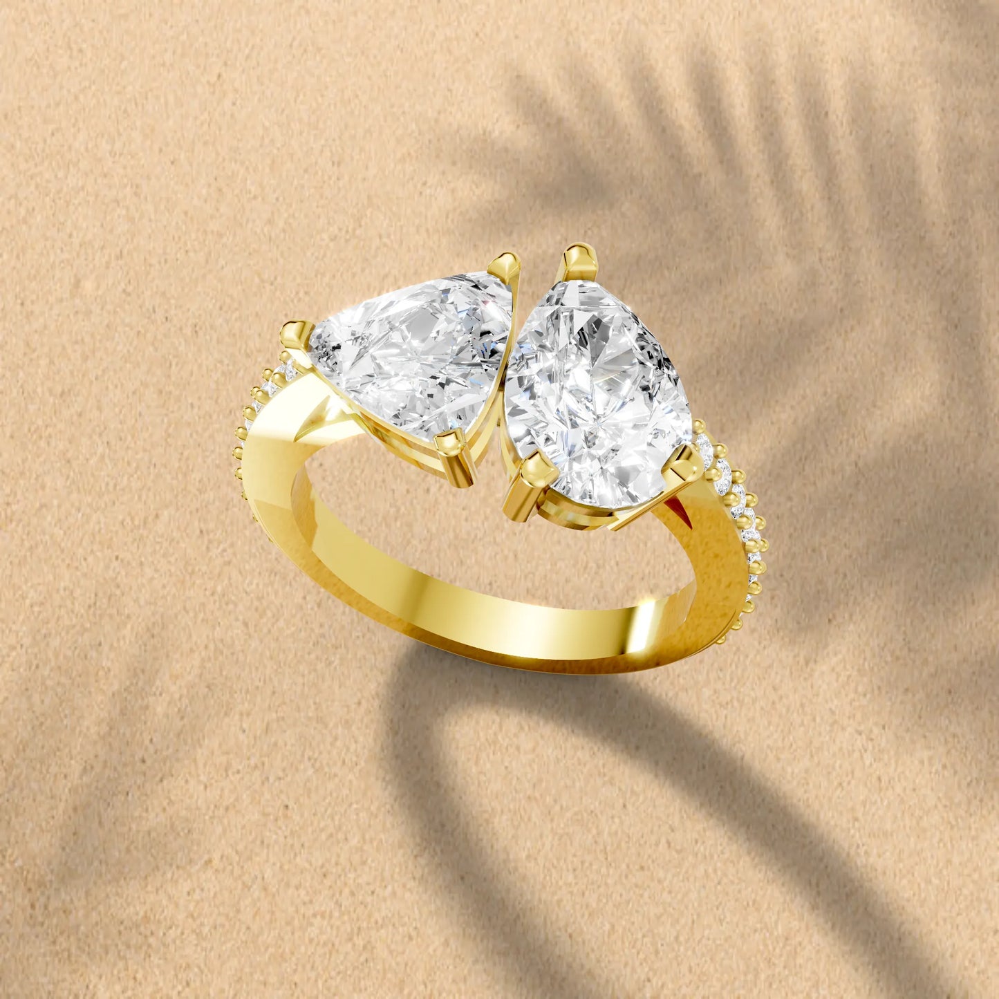 14K Gold Trillion and Pear Cut Diamond Toi et Moi Engagement Ring with Side Accents