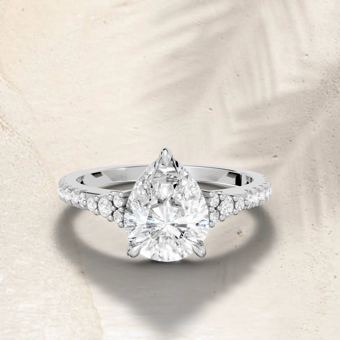 14K Gold Pear Cut Diamond Side Cluster Cathedral Engagement Ring with Side Accents