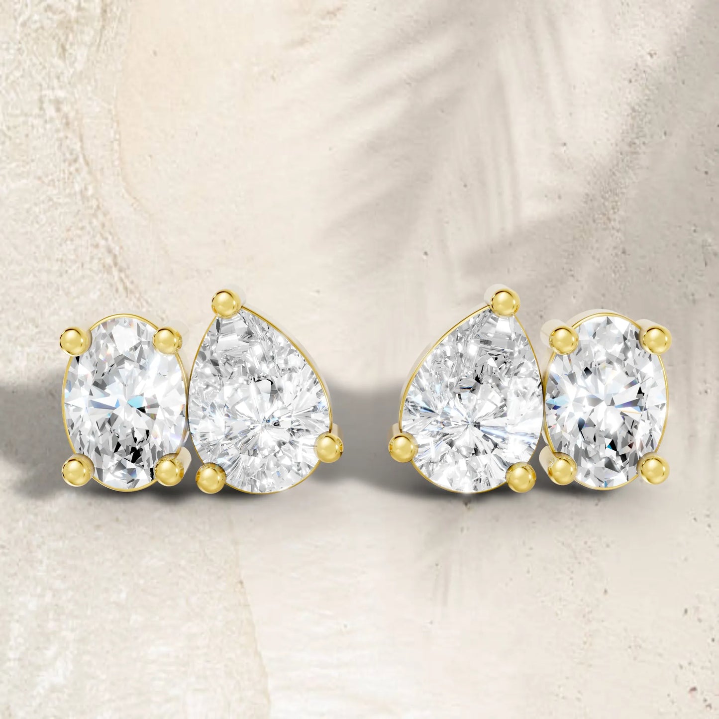 14K Gold Pear and Oval Cut Diamond Toi et Moi Stud Earring