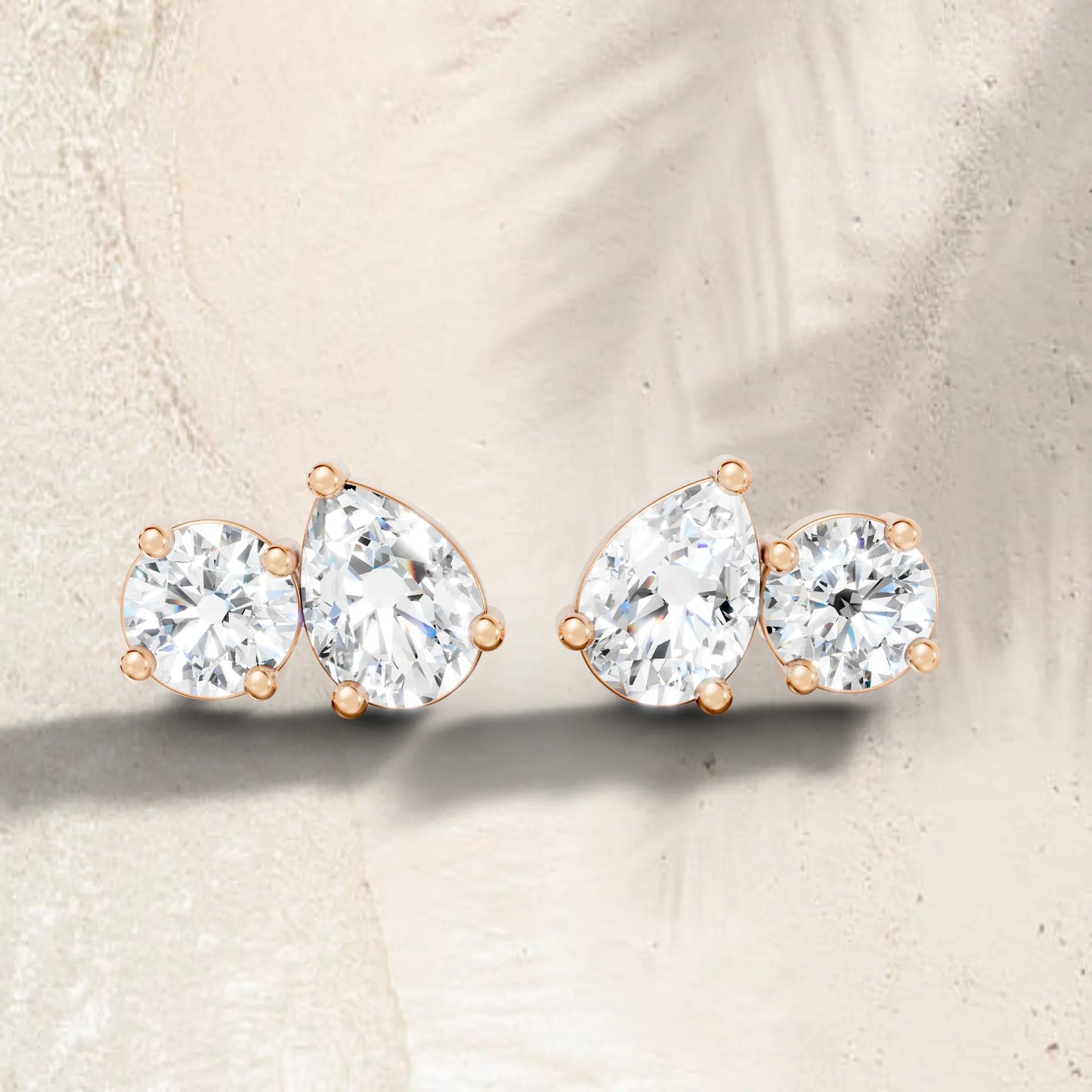 14K Gold 1.30 CT Pear And Round Minimalist Toi Et Moi Stud | Designed With Lab Grown Diamonds In Elegant Prong Settings | Celebrate Love With A Special Earring That Captures Timeless Beauty Modern Grace And The Spark Of Everlasting Romance