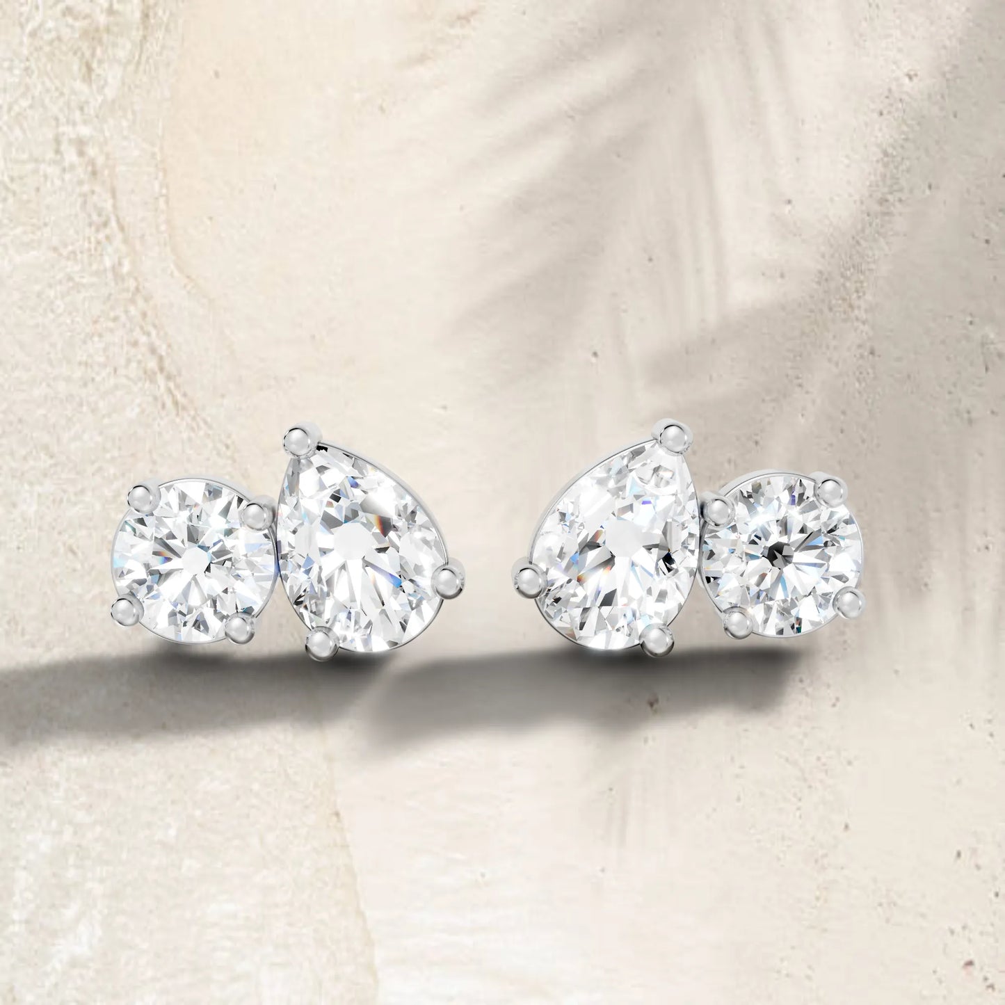 14K Gold 1.30 CT Pear And Round Minimalist Toi Et Moi Stud | Designed With Lab Grown Diamonds In Elegant Prong Settings | Celebrate Love With A Special Earring That Captures Timeless Beauty Modern Grace And The Spark Of Everlasting Romance