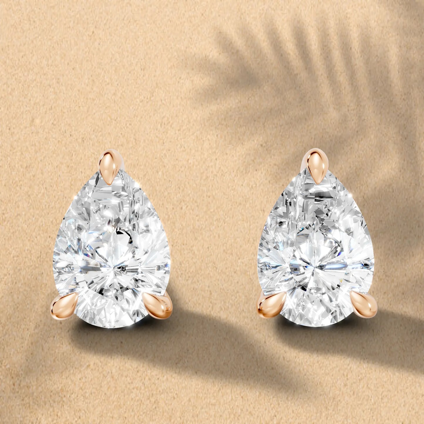 14K Gold Pear Cut Diamond Solitaire Stud Earring