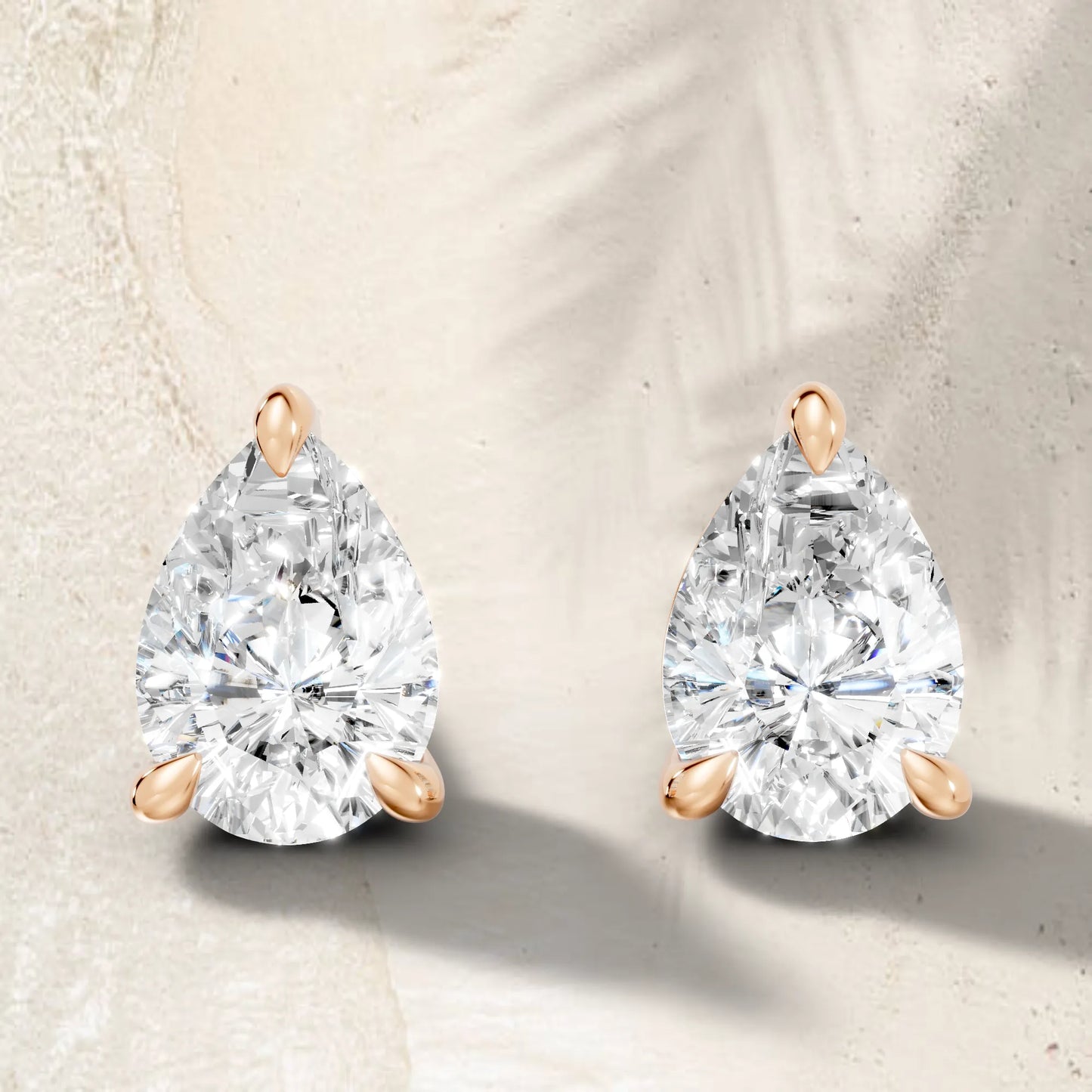 14K Gold Pear Cut Diamond Solitaire Stud Earring