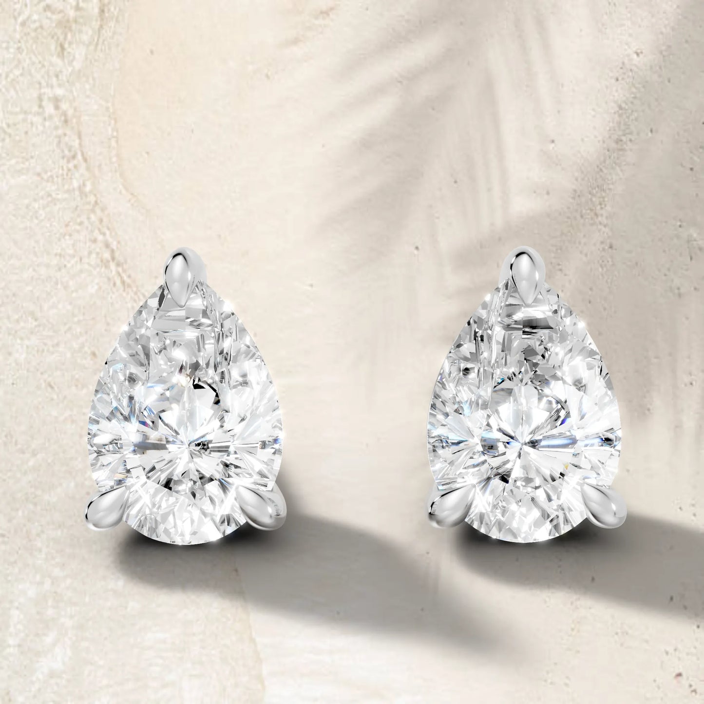 14K Gold Pear Cut Diamond Solitaire Stud Earring