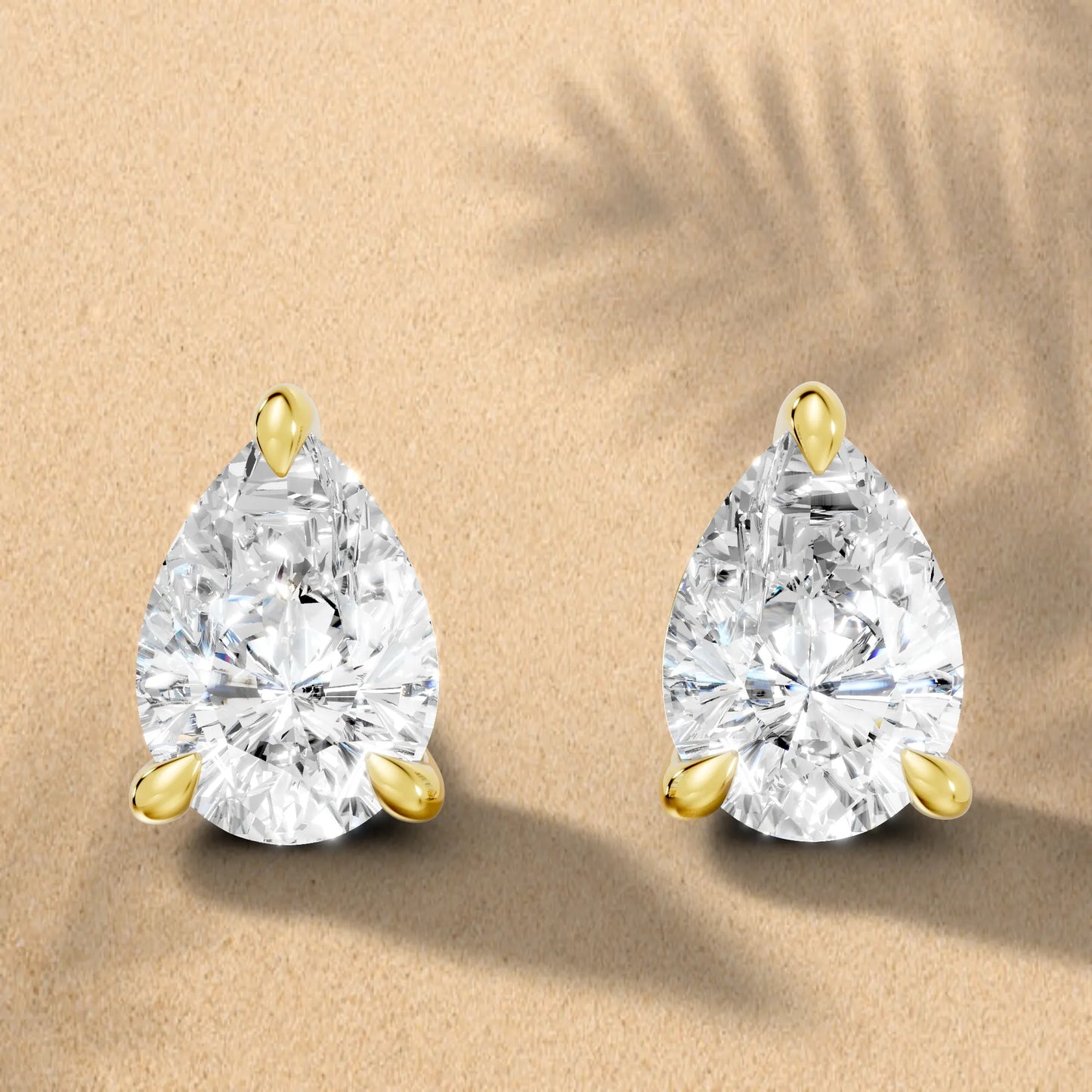 14K Gold Pear Cut Diamond Solitaire Stud Earring