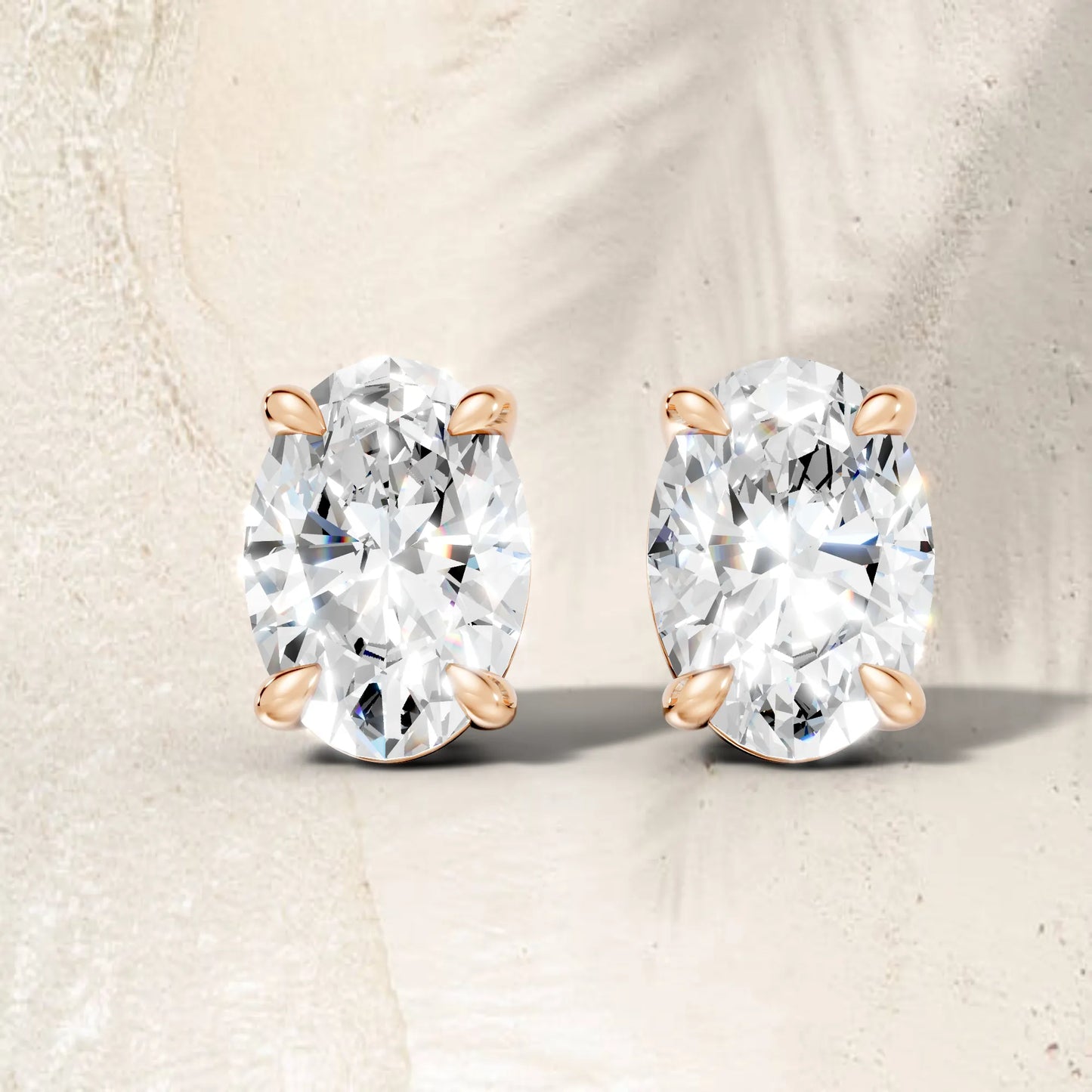 14K Gold Oval Cut Diamond Solitaire Stud Earring