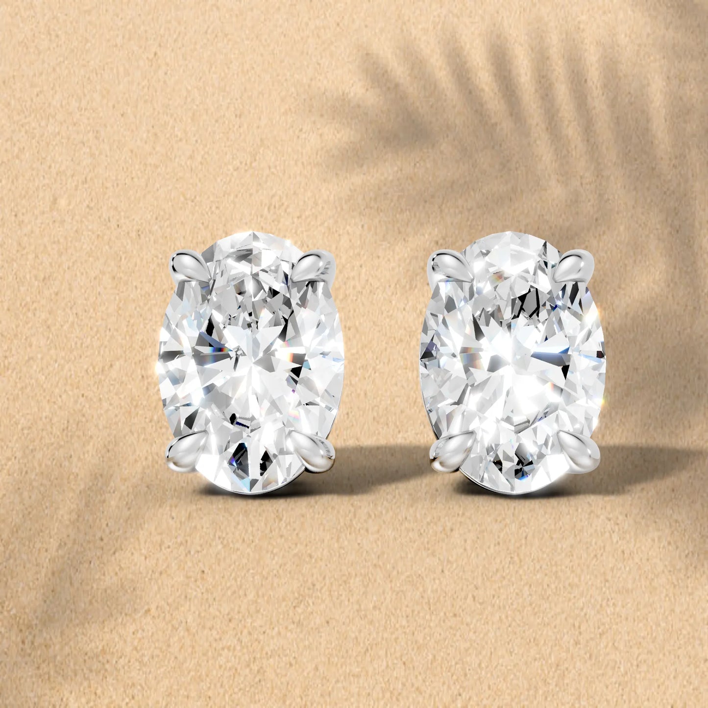 14K Gold Oval Cut Diamond Solitaire Stud Earring