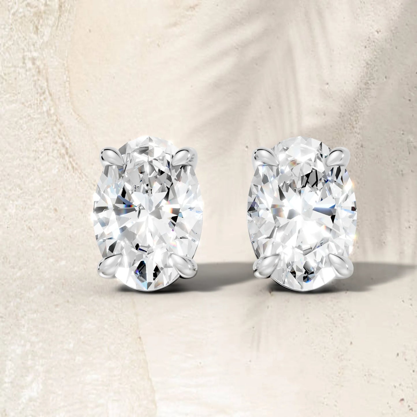 14K Gold Oval Cut Diamond Solitaire Stud Earring