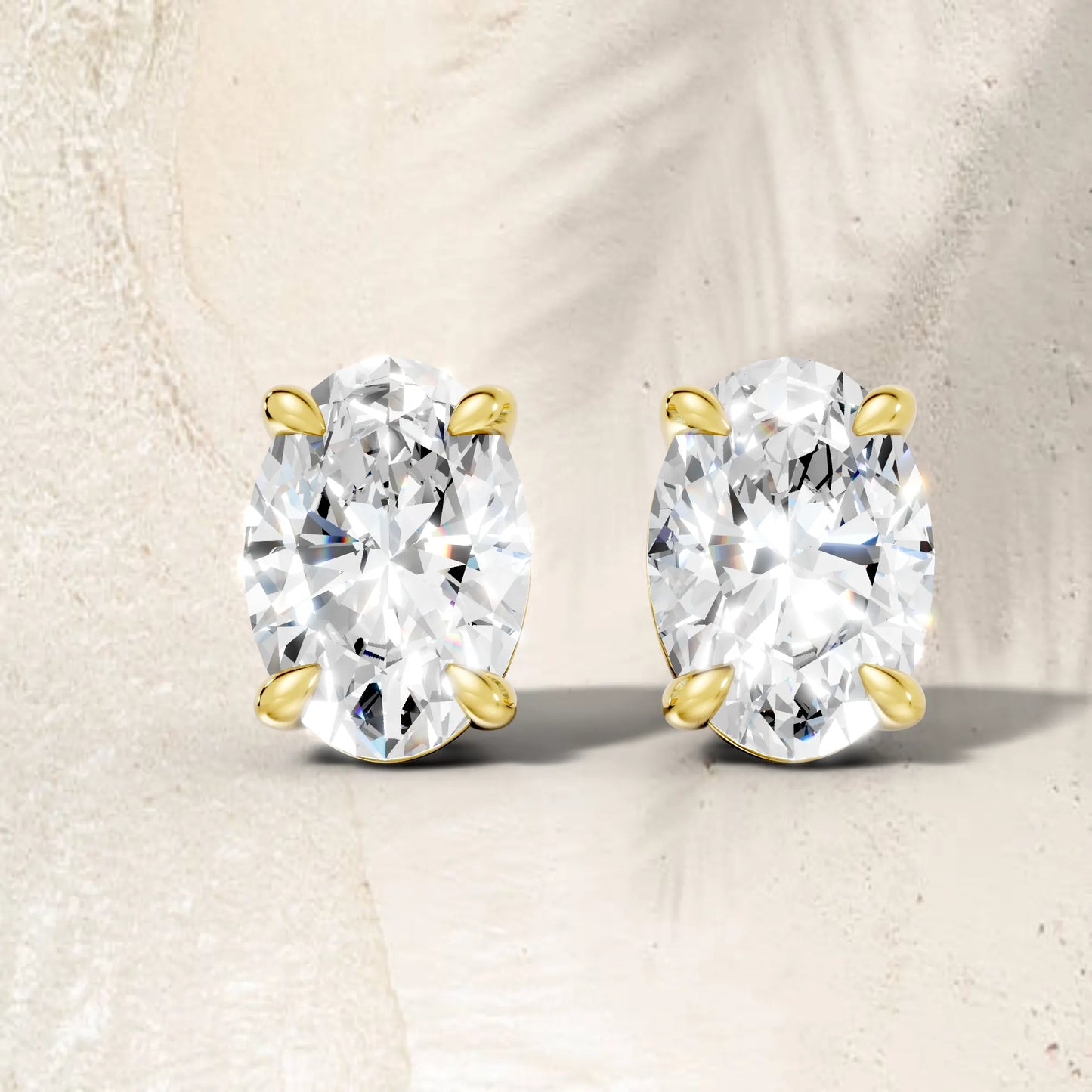 14K Gold Oval Cut Diamond Solitaire Stud Earring
