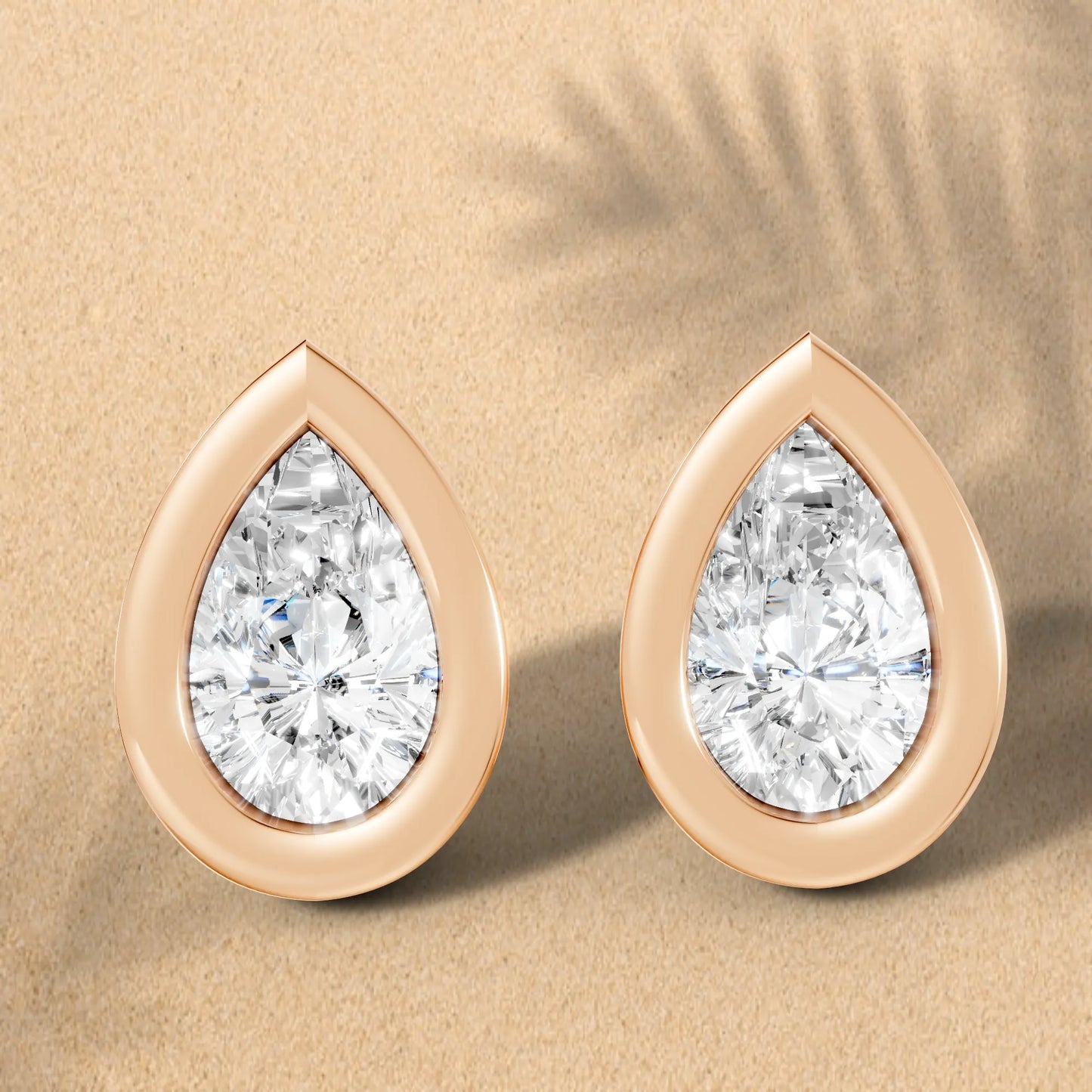 14K Gold Pear Cut Diamond Bezel Stud Earring