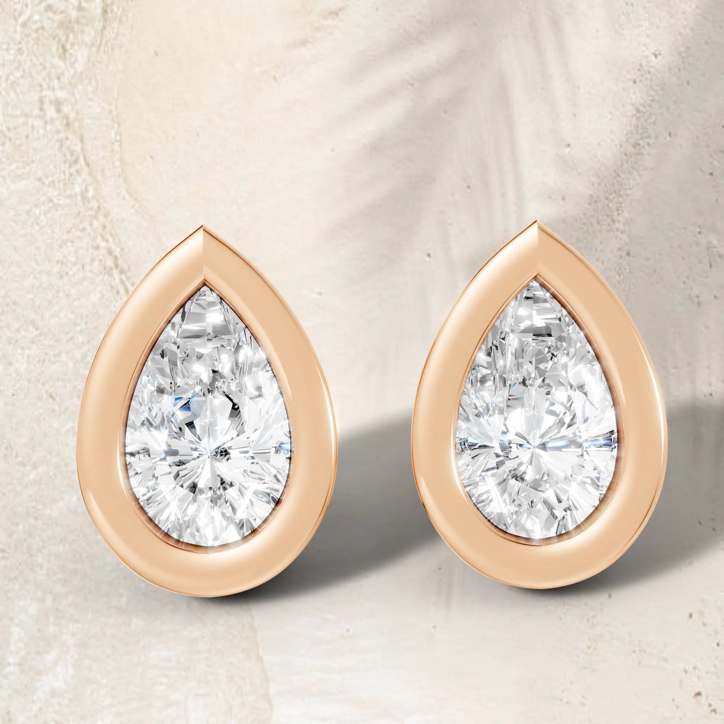 14K Gold Pear Cut Diamond Bezel Stud Earring