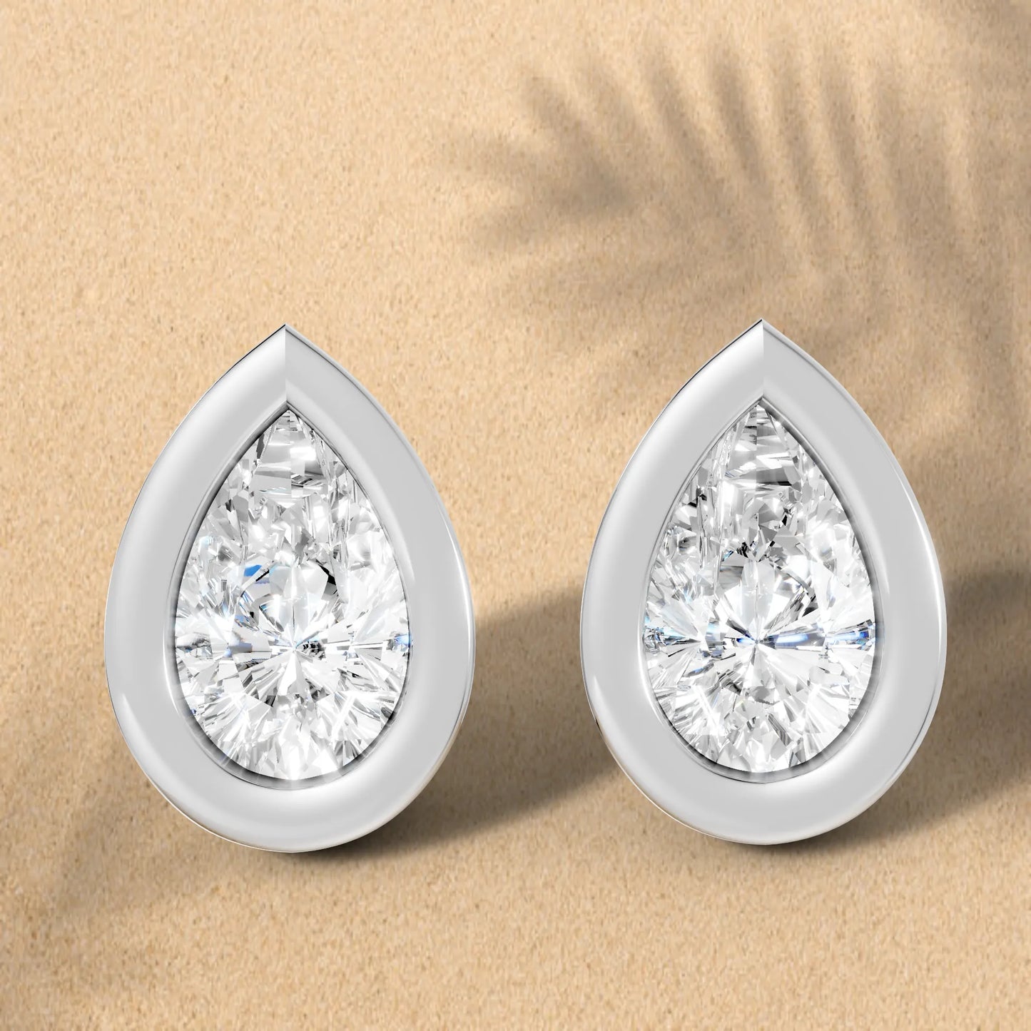 14K Gold Pear Cut Diamond Bezel Stud Earring