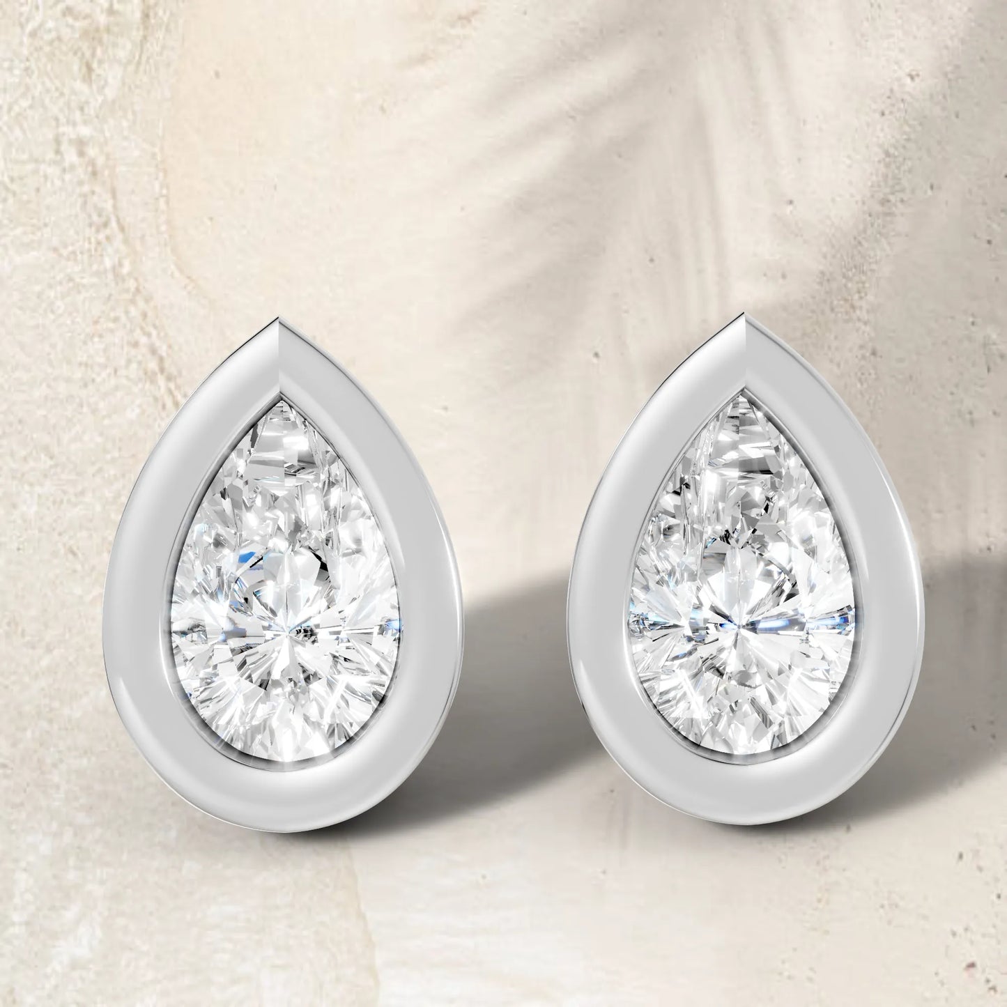 14K Gold Pear Cut Diamond Bezel Stud Earring