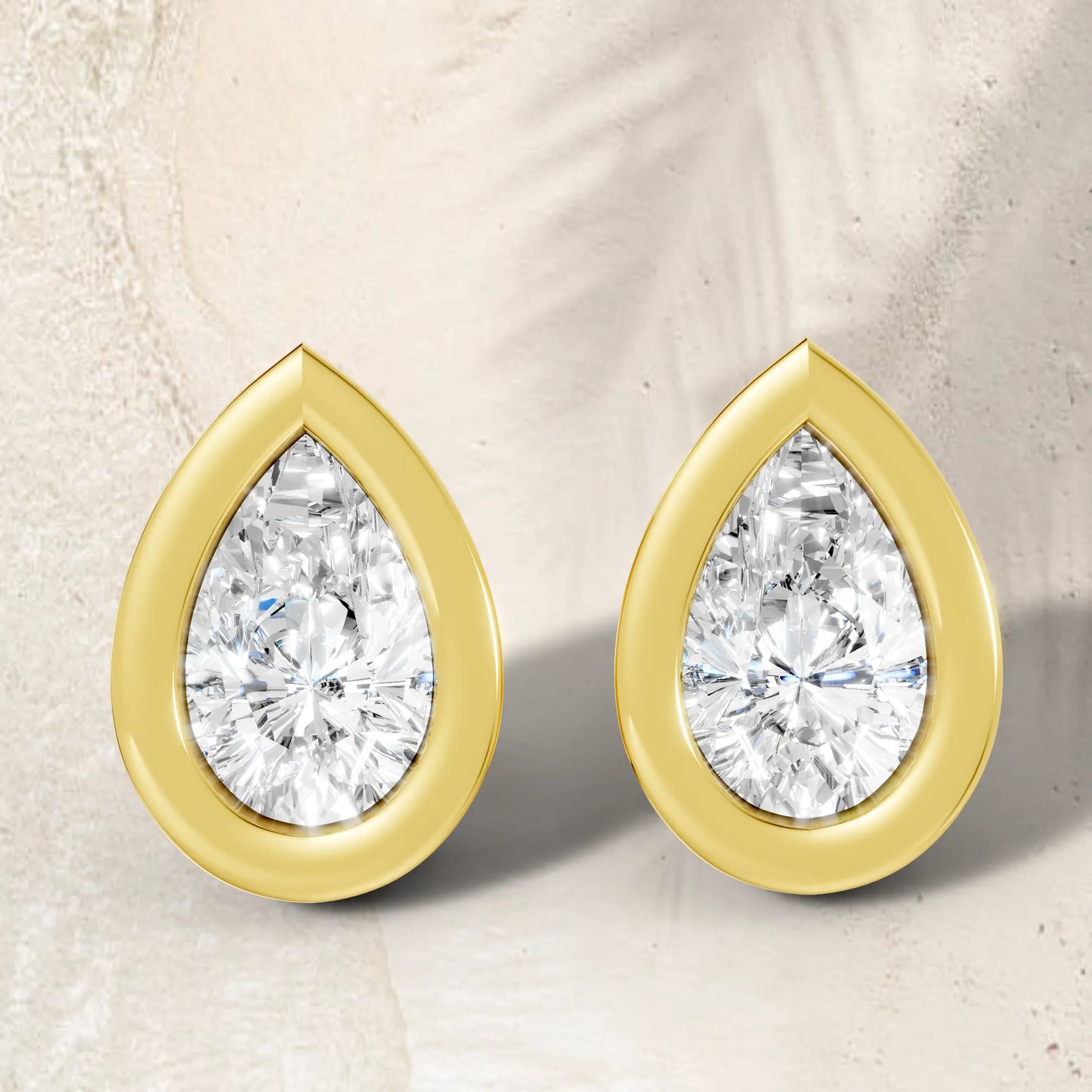14K Gold Pear Cut Diamond Bezel Stud Earring